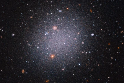 Hubble telescope image showing faint dark galaxy CDG-2 with globular clusters