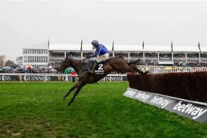 Il Etait Temps jumping the final fence during the Queen Mother Champion Chase at Cheltenham Festival.
