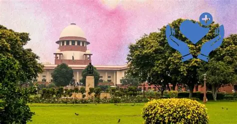 Harish Rana’s mother caring for him while he lies in bed in a vegetative state