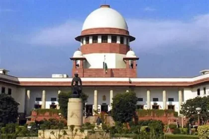 Mother of Harish Rana sitting beside him in hospital bed