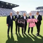 Lionel Messi celebrates with Inter Miami as a stadium stand is named in his honour