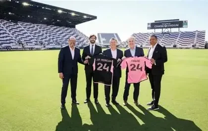 Lionel Messi celebrates with Inter Miami as a stadium stand is named in his honour
