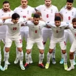 Iran players sing and salute national anthem before Asian Cup match against Australia