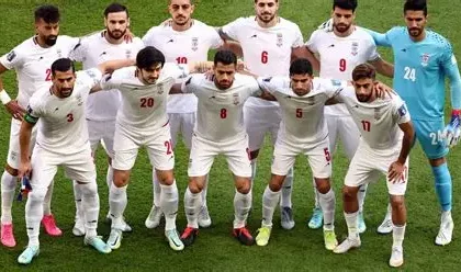 Iran players sing and salute national anthem before Asian Cup match against Australia