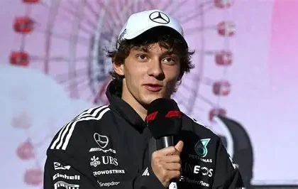 Kimi Antonelli celebrating his Japanese Grand Prix victory after taking championship lead