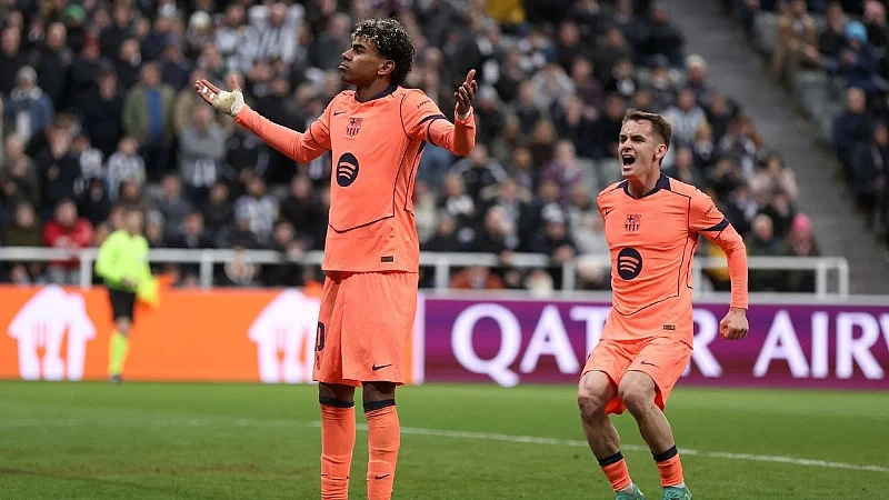 Lamine Yamal scoring late penalty against Newcastle in Champions League