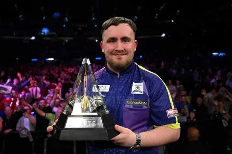 Luke Littler celebrates Premier League darts win over Jonny Clayton in Cardiff