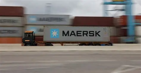 Maersk container ship navigating global shipping routes amid Iran conflict.