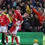Manchester City players react after draw with Nottingham Forest in Premier League title race