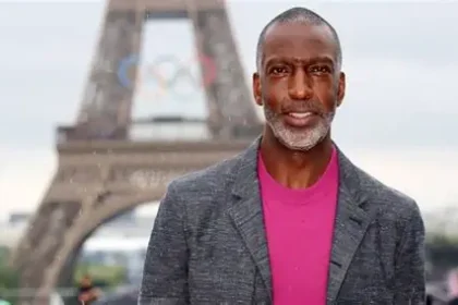 Michael Johnson speaking at a press conference about Grand Slam Track league