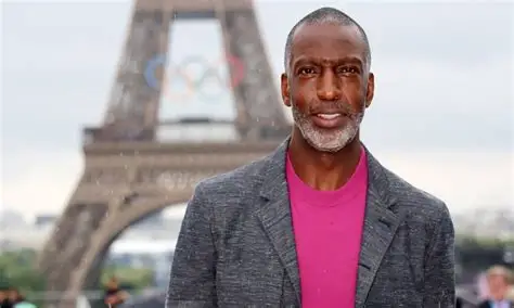 Michael Johnson speaking at a press conference about Grand Slam Track league