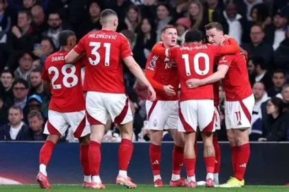 Nottingham Forest players celebrating Europa League penalty shootout win in Denmark