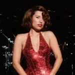 Raye performing songs from This Music May Contain Hope with orchestra