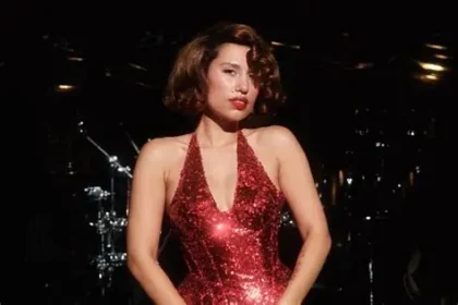 Raye performing songs from This Music May Contain Hope with orchestra