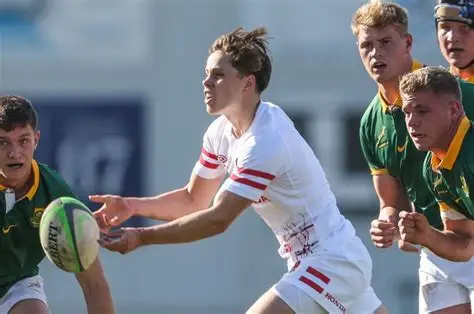 Lucas Friday practicing rugby passing drills at Harlequins