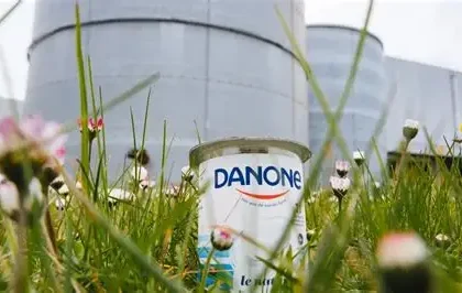 Huel meal replacement products displayed with Danone branding