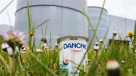 Huel meal replacement products displayed with Danone branding