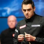 Ronnie O’Sullivan celebrates a century break during the World Open snooker tournament.