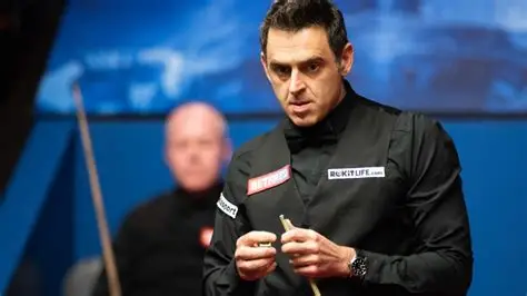 Ronnie O’Sullivan celebrates a century break during the World Open snooker tournament.