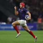 Louis Bielle-Biarrey sprinting during a Six Nations rugby match for France.