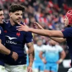 Scotland rugby players celebrating victory over France in Six Nations