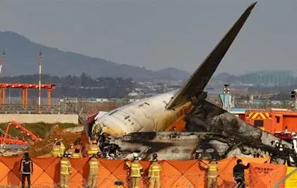 Investigators examine debris from the Jeju Air Flight 2216 crash at Muan International Airport.