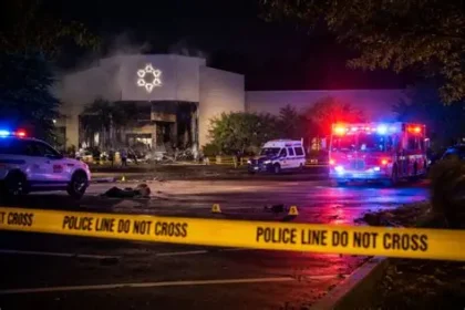 Police and emergency vehicles outside Temple Israel synagogue after a vehicle ramming incident in Michigan.