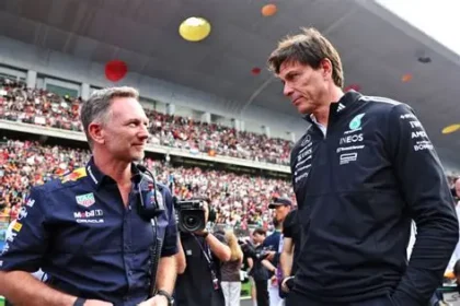 Christian Horner and Toto Wolff during a Formula 1 race weekend discussion