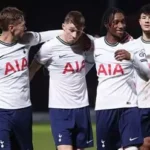 Tottenham Hotspur players reacting during a difficult Premier League match