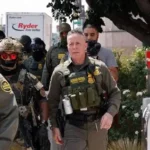 US Border Patrol Chief Greg Bovino speaking at a press conference