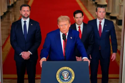 Donald Trump attending a NATO meeting while tensions rise over the Strait of Hormuz crisis.