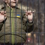 Ukrainian children displaced by war waiting for assistance