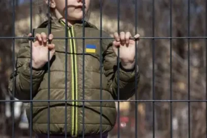 Ukrainian children displaced by war waiting for assistance