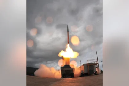 THAAD missile defence system launcher deployed at a military base.