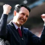 Unai Emery celebrates with Aston Villa players after reaching 100 wins as manager.