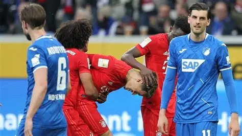 Masked fan entering pitch and unplugging VAR monitor during German football match