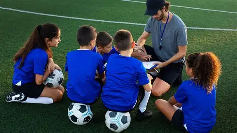 Young football academy players training on a pitch during development session
