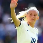 Chloe Kelly with her Barbie doll in England football kit