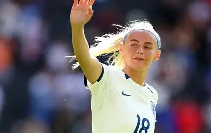 Chloe Kelly with her Barbie doll in England football kit