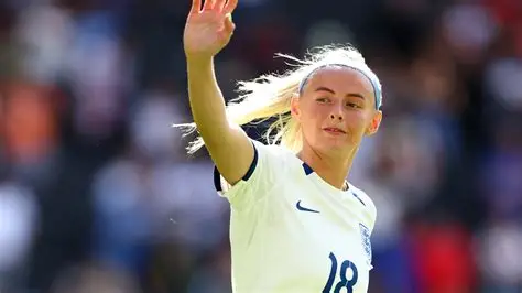 Chloe Kelly with her Barbie doll in England football kit