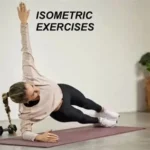 Person holding a wall squat as part of isometric exercise routine