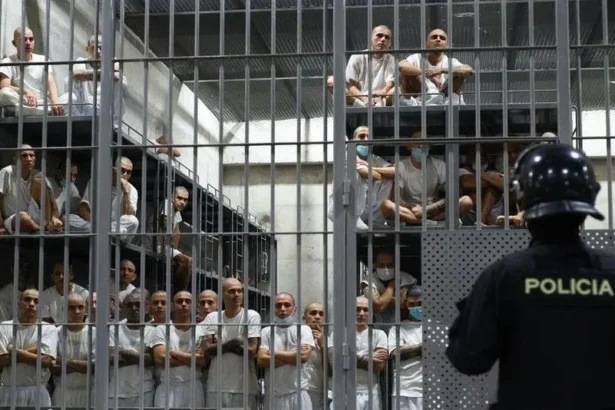 Exploring the world’s most notorious prisons dark corridor with iron bars