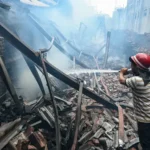 Smoke rises from India fireworks blast site in Kerala after deadly factory explosion killing 13 workers