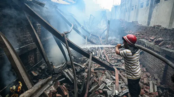 Smoke rises from India fireworks blast site in Kerala after deadly factory explosion killing 13 workers