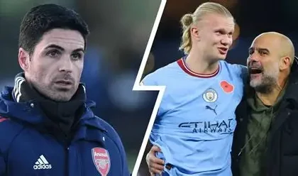 Arsenal and Manchester City players competing in a Premier League title race match at the Etihad Stadium