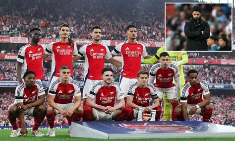 Mikel Arteta pumps fist passionately from Arsenal touchline, rallying Gunners with intense "pure fire" expression during key match.