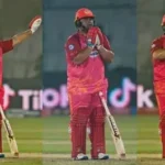 Azam Khan celebrates his explosive 74-run innings during Karachi Kings' PSL victory over Rawalpindiz, fist-pumping amid cheering teammates.