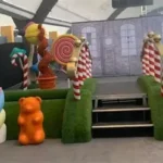 Barbie Dream Fest venue in Florida showing sparse decorations and minimal attractions after attendees reported disappointment and compared it to a viral Glasgow event.