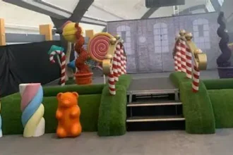 Barbie Dream Fest venue in Florida showing sparse decorations and minimal attractions after attendees reported disappointment and compared it to a viral Glasgow event.