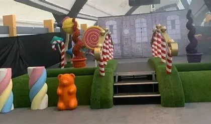 Barbie Dream Fest venue in Florida showing sparse decorations and minimal attractions after attendees reported disappointment and compared it to a viral Glasgow event.